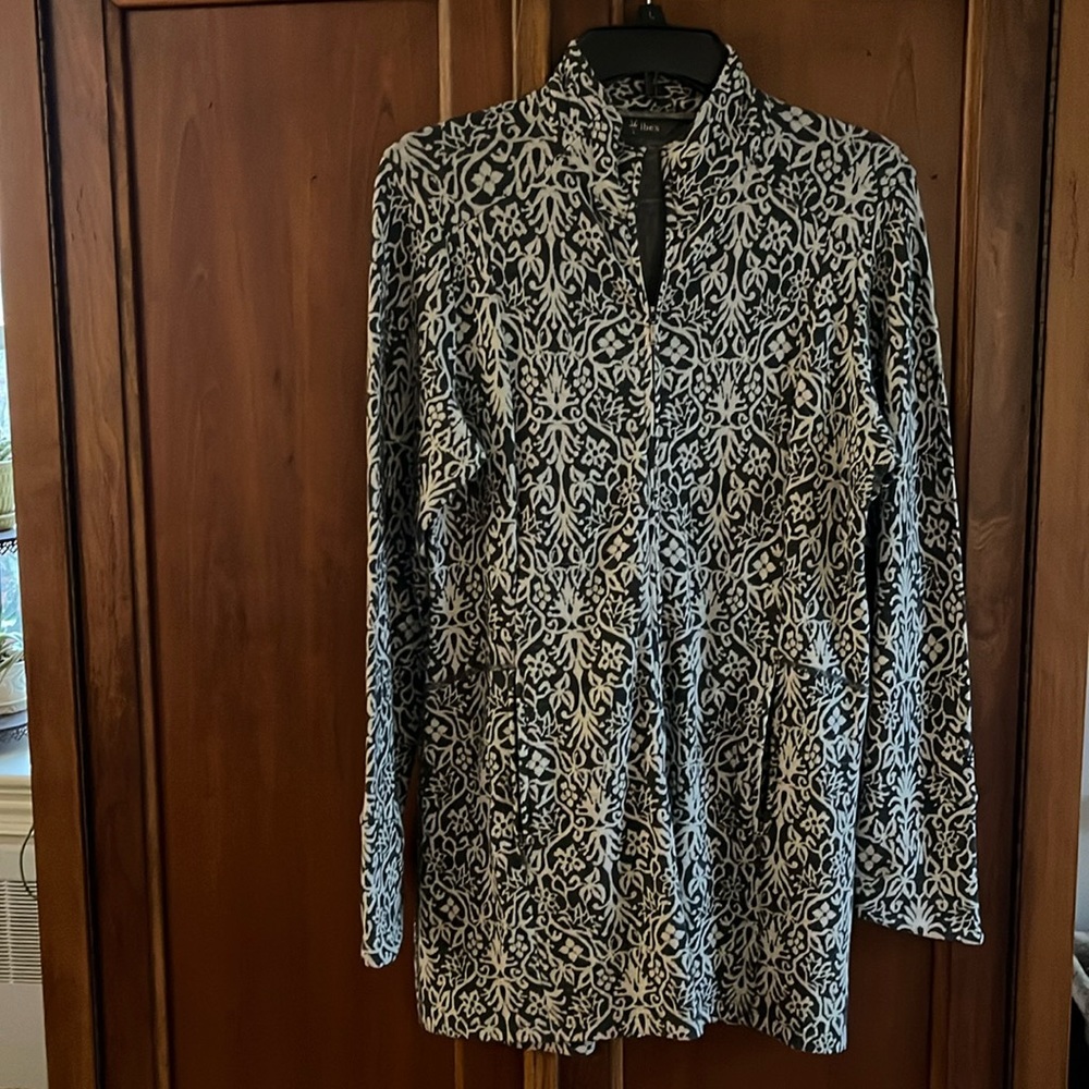 Ibex zip up, lightweight, jacket.  Great condition.